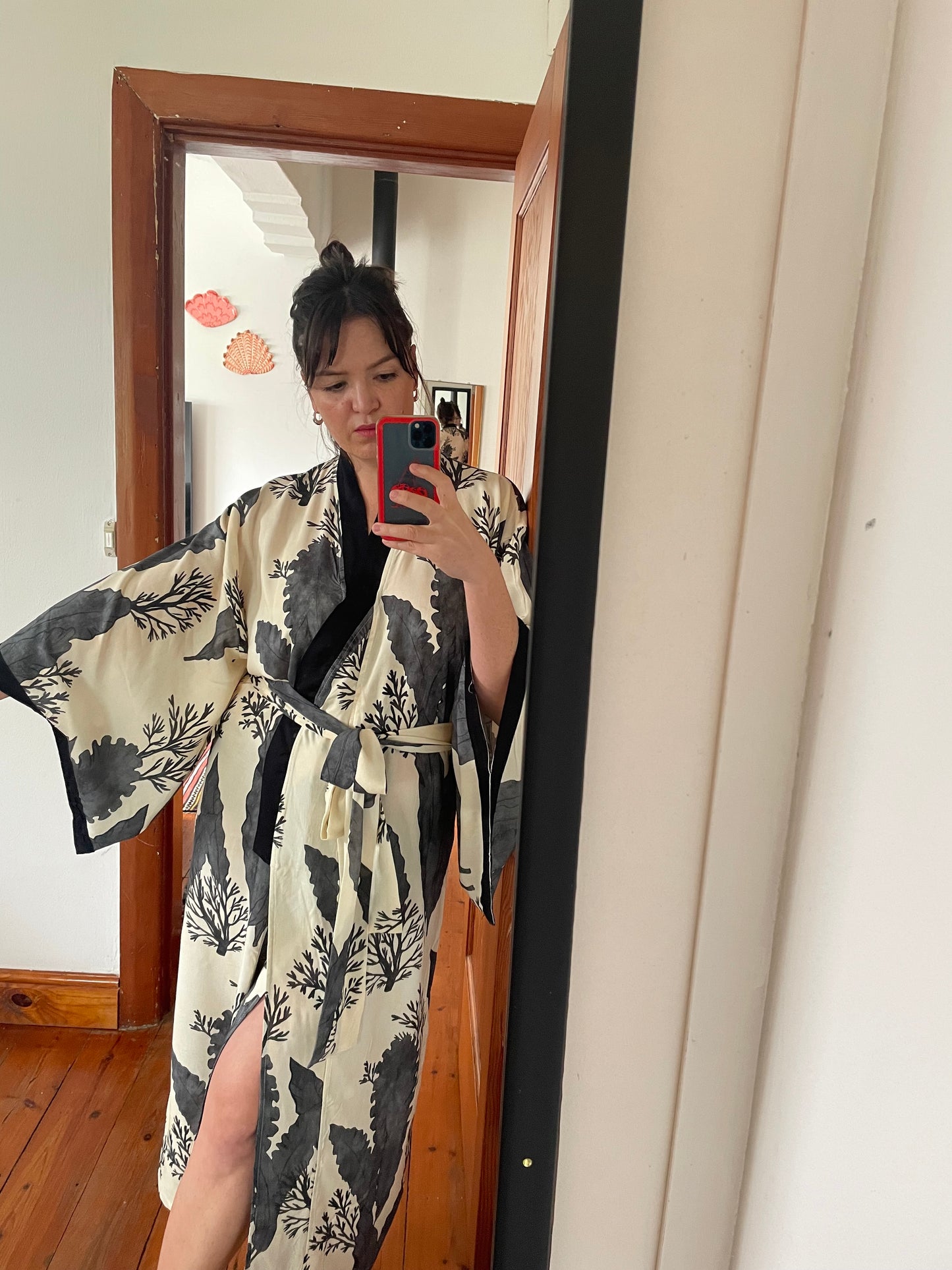 woman wearing printed kimono